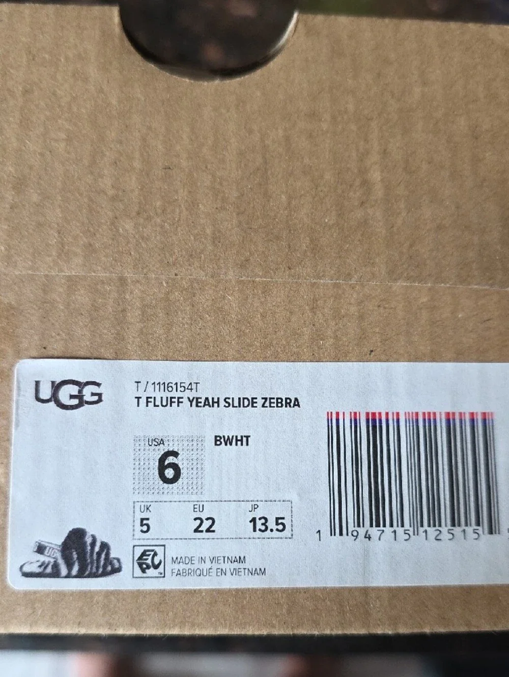 UGG Kid’s Fluff Yeah Zebra Faux Fur Slides